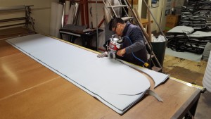 Cutting longboard bag panels.